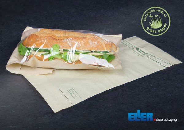 Panvas long aus Graspapier verpackt einen Snack umweltfreundlich.